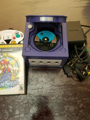 1 Nintendo gamecube + Super Mario Sinshine!!!!!