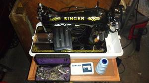 Antigua maquina de coser singer sin uso completa con