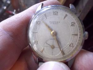 antiguo reloj a cuerda rooney caballero funcionnado