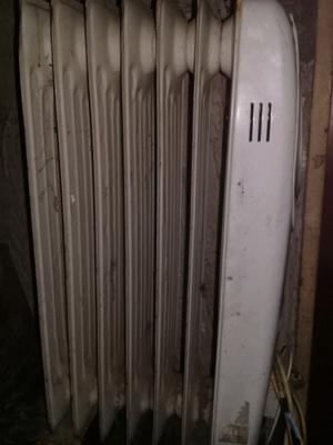 Vendo estufa radiador usado