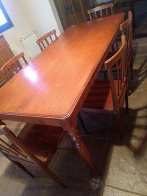 Vendo juego de mesa y 6 sillasde cedro usado