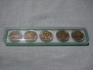 Monedas del bicentenario en cajita