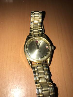 Reloj Rado dorado Suizo