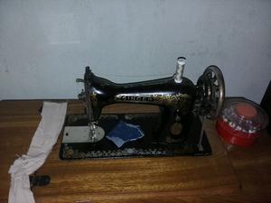 Maquina de coser a pedal impecable