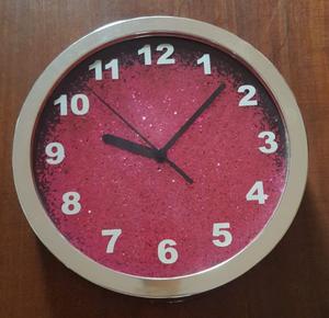 Reloj con glitter rosa