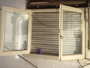 Ventanas de madera con persiana