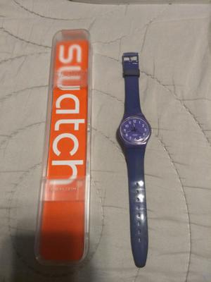 Reloj Swatch violeta