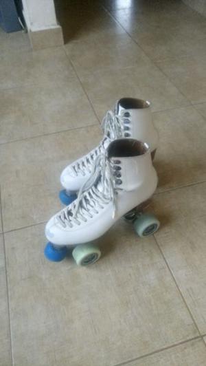 Excelente patines de bota