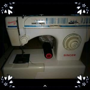 Máquina de coser marca singer florencia 57