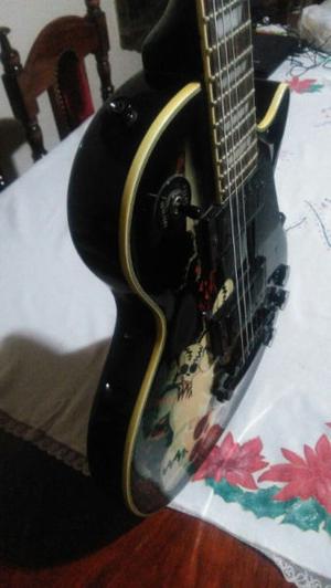 Guitarra Electrica Les Paul + funda y accesorios