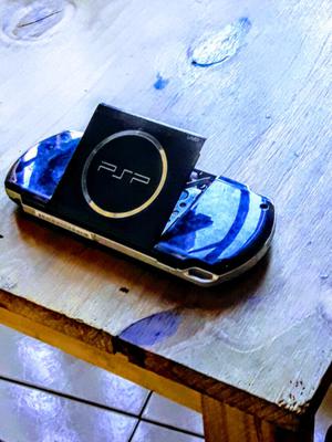 Psp  con cargador y funda