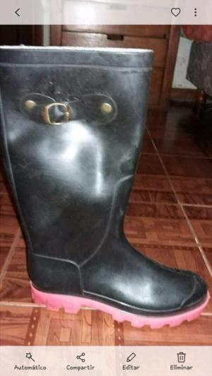 Botas de lluvia usadas y nuevas 36