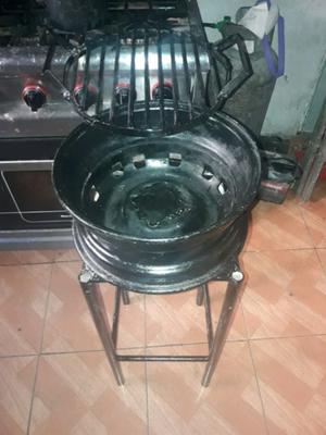 Parrilla con llanta de auto.liquido.whatsap