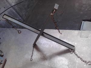 Pinza cruz para fardos