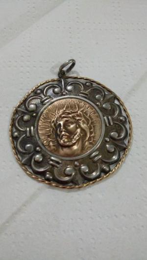 Medalla antigua cara de Cristo en oro y plata