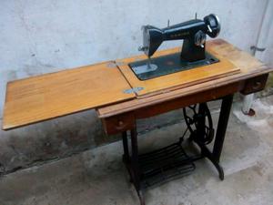 Maquina de coser antigua cabiró