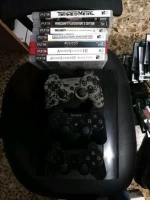 Playstation 3 usada con cables, juegos y joystick