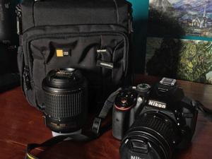Nikon D + lente extra mm + bolso + tarjeta SD 32GB