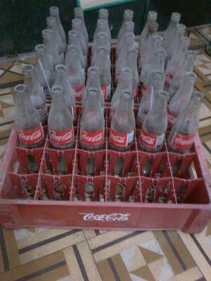 36 Envases de Coca de 350 Ml + 2 cajones.