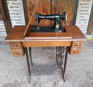 Maquina de coser singer antigua