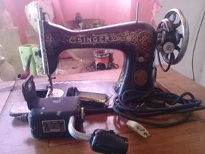 MÁQUINA singer usada con mueble