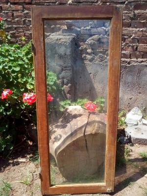 Tres postigos de cedro con vidrio sin marco