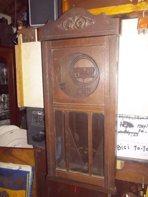 antigua caja de reloj de pared de roble espejada con espiral
