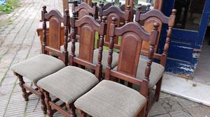 Antiguas sillas de estilo de algarrobo tapizadas
