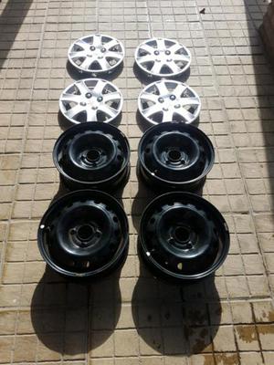 4 llantas y 4 tazas originales peugeot 207