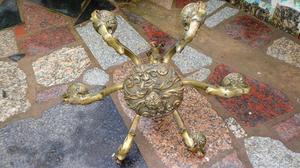 araña de bronce seis luces con figuras de dragones y flores
