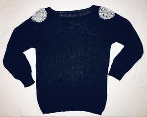 Sweater de lana con apliques de perlitas