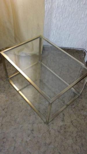 mesa ratona de bronce y vidrio