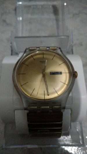 Reloj Swatch Dorado