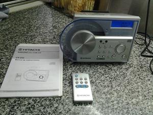 Radio Reloj marca Hitachi con lectora de Cd y control remoto