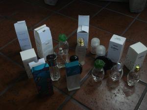 12 frascos de perfumes vacios