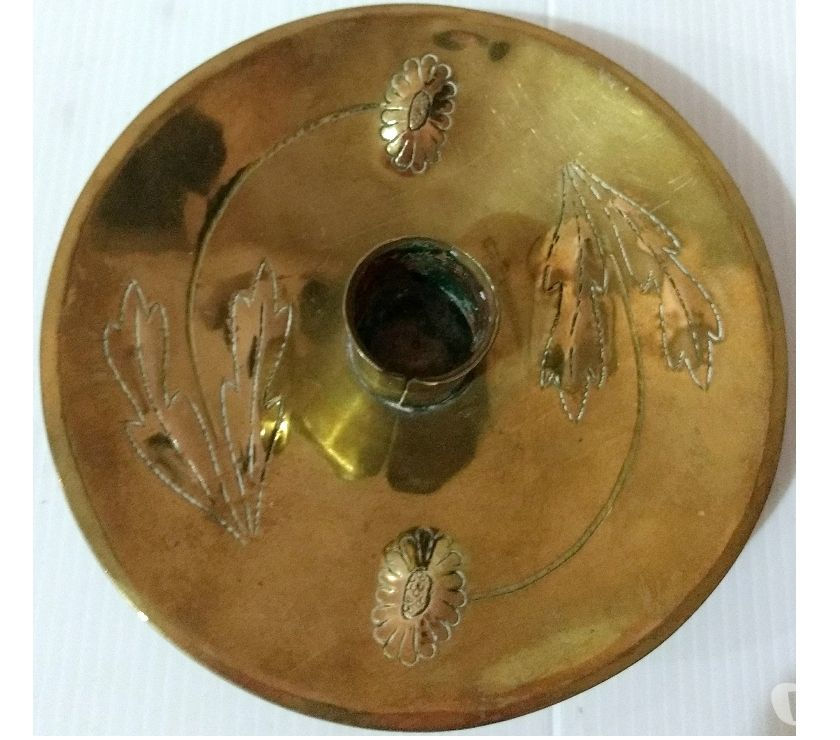 Porta vela de bronce circular