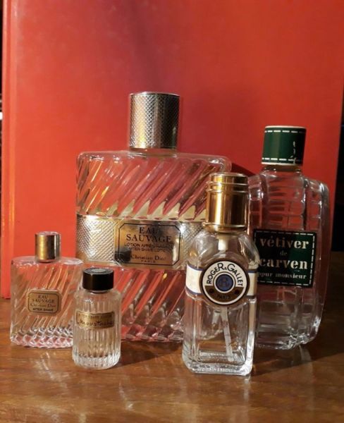 Frascos vacíos de 8 perfumes importados