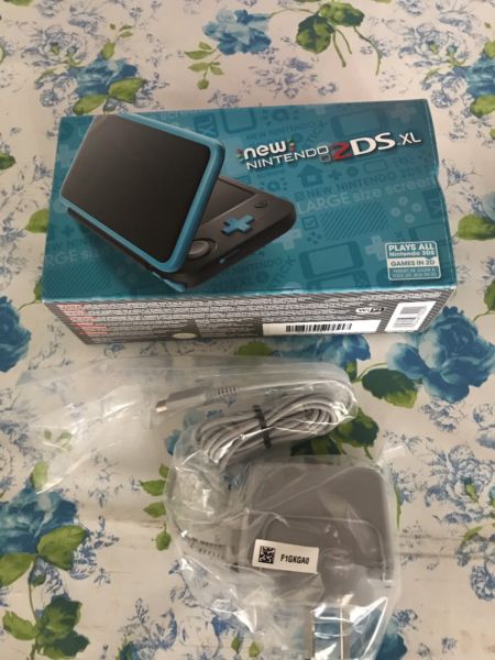 New 2ds xl nuevo sin usar con cargador