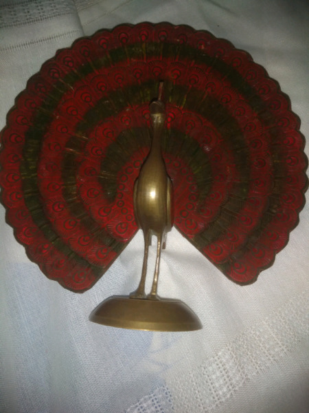 Pavo real antiguo impecable