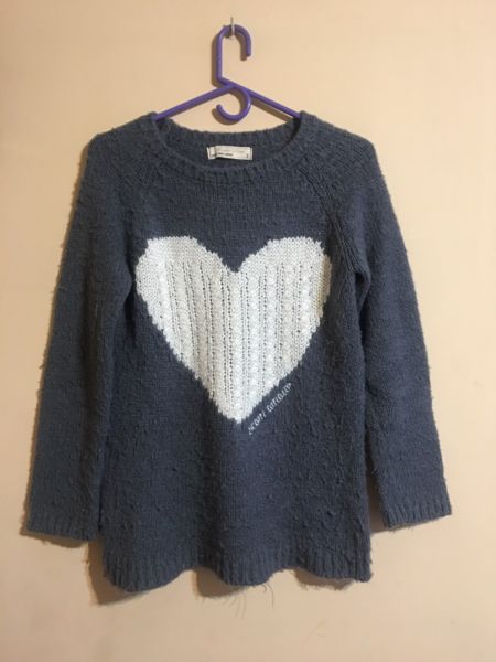 Suéter con corazón $50