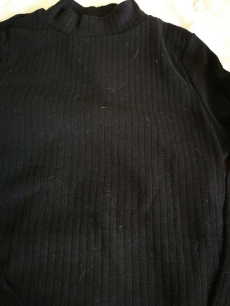 Sweater negro uniclo talla 2 sin uso