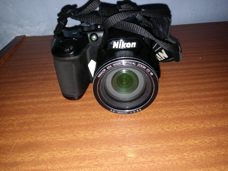 Vendo camara nikon b500 semi réflex coolpix
