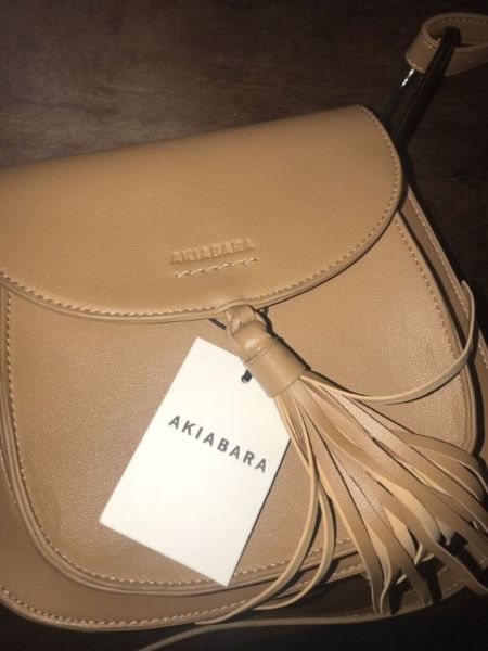 cartera Akiabara original sin uso de mujer