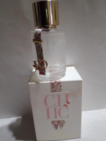 FRASCO DE PERFUME VACÍO DE CAROLINA HERRERA l'EAU