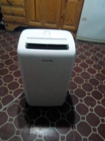 vendo acondicionador frio/calor,poco uso,completo