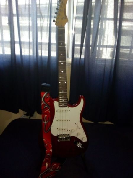 Guitarra eléctrica Samick Stratocaster usada.