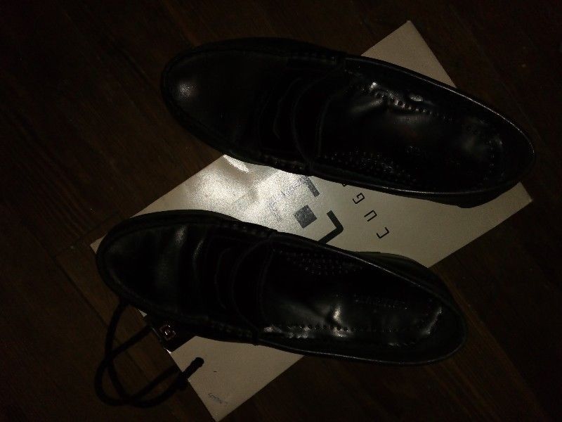 Zapatos mocacines negros de hombre