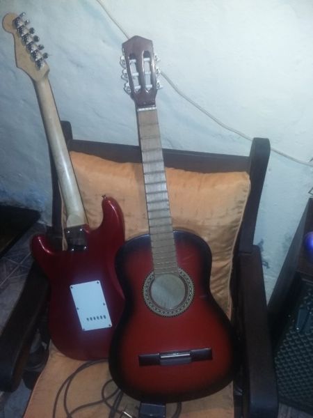 Guitarra Acústica Negra Roja sin uso