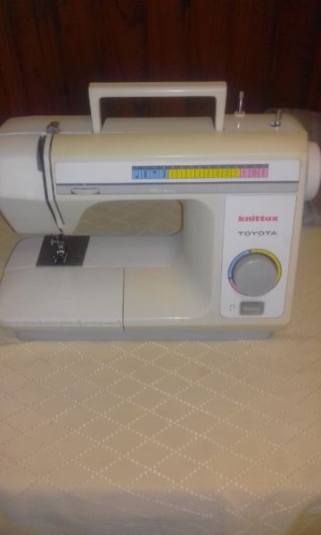 Maquina de coser.