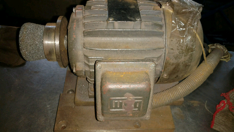 Motor de rectificadora con base mecanizada
